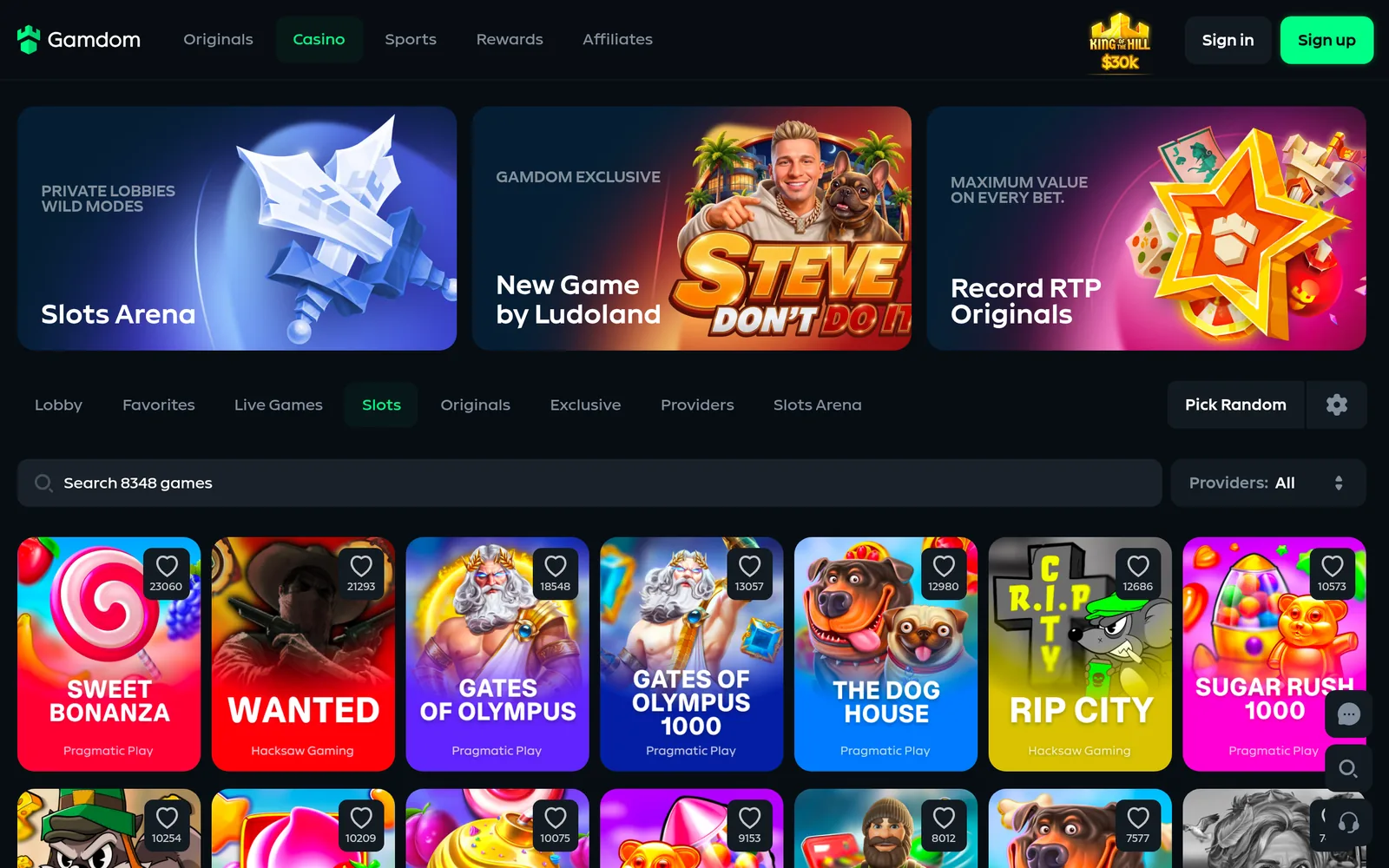 Gamdom slots lobby — the Slots category with provider filter and game tiles